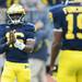 Michigan senior quarterback Denard Robinson smiles during warm ups against Northwester an Michigan Stadium on Saturday. Melanie Maxwell I AnnArbor.com